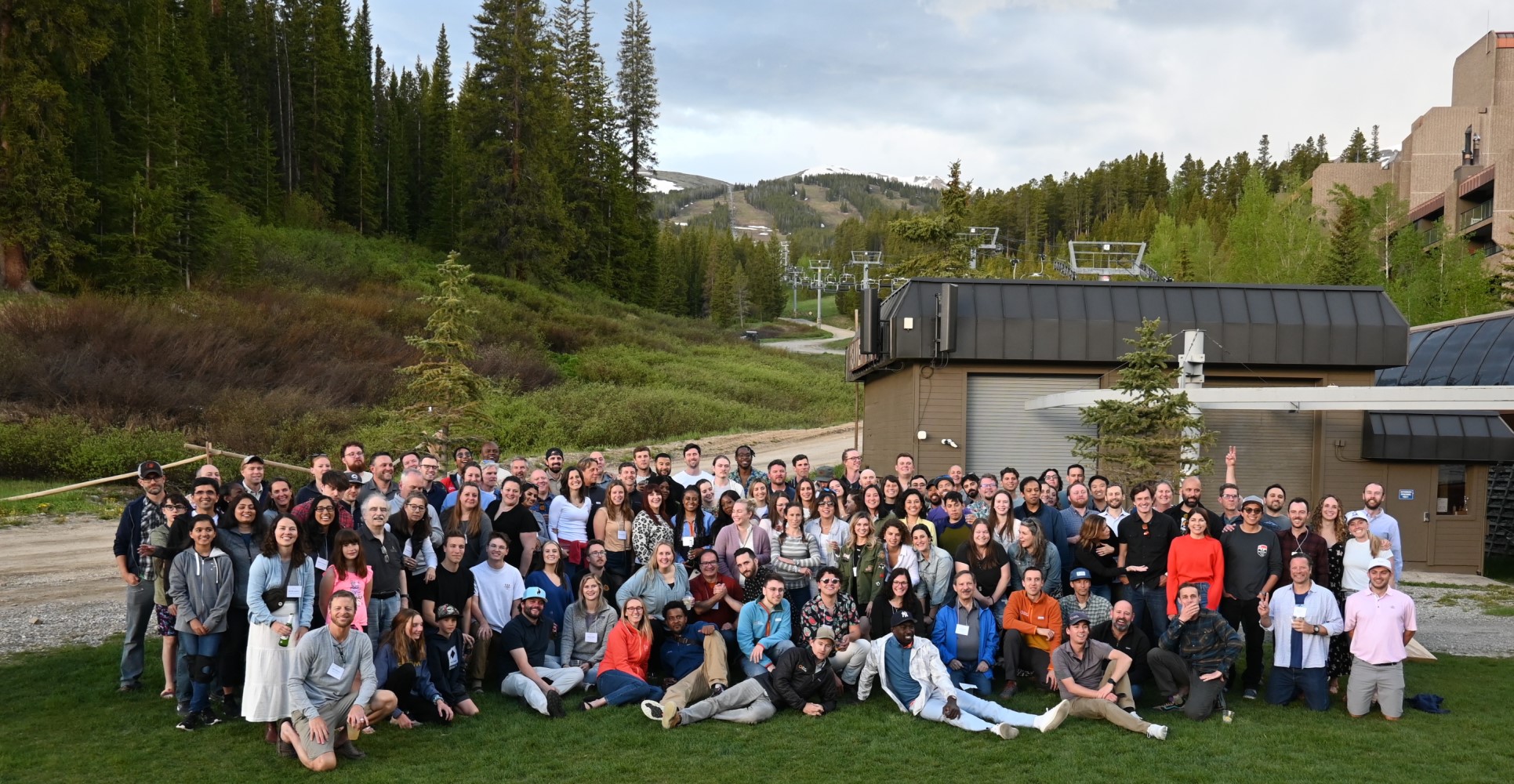 A photo of the Pivot Energy team in front of a ski lift location in the mountains